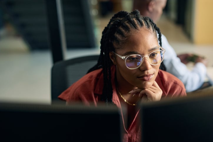 Woman reading on computer